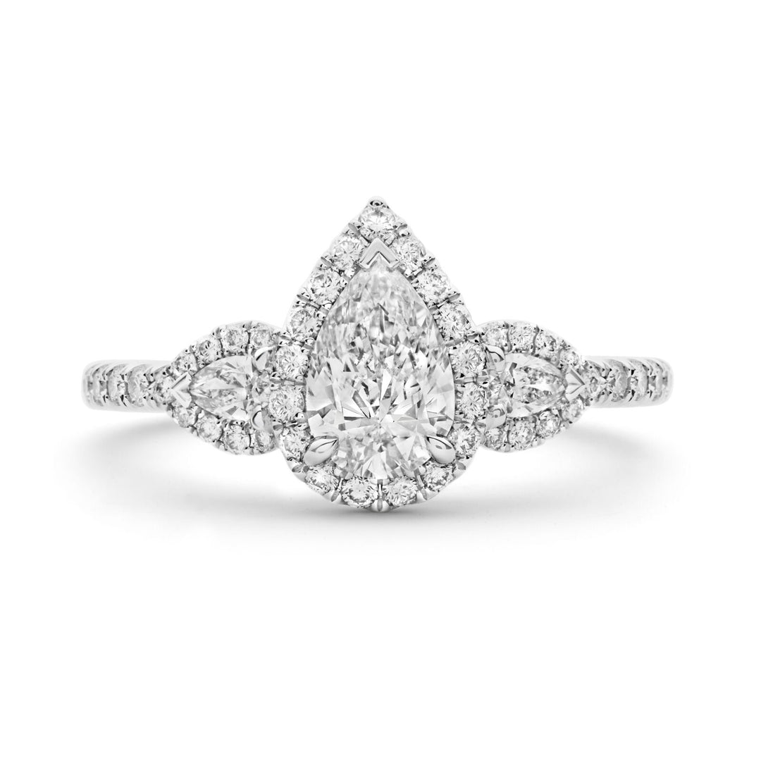 Pear shaped engagement ring featuring a 0.50ct pear cut diamond set in three claws, with a pear cut diamond claw set on each side