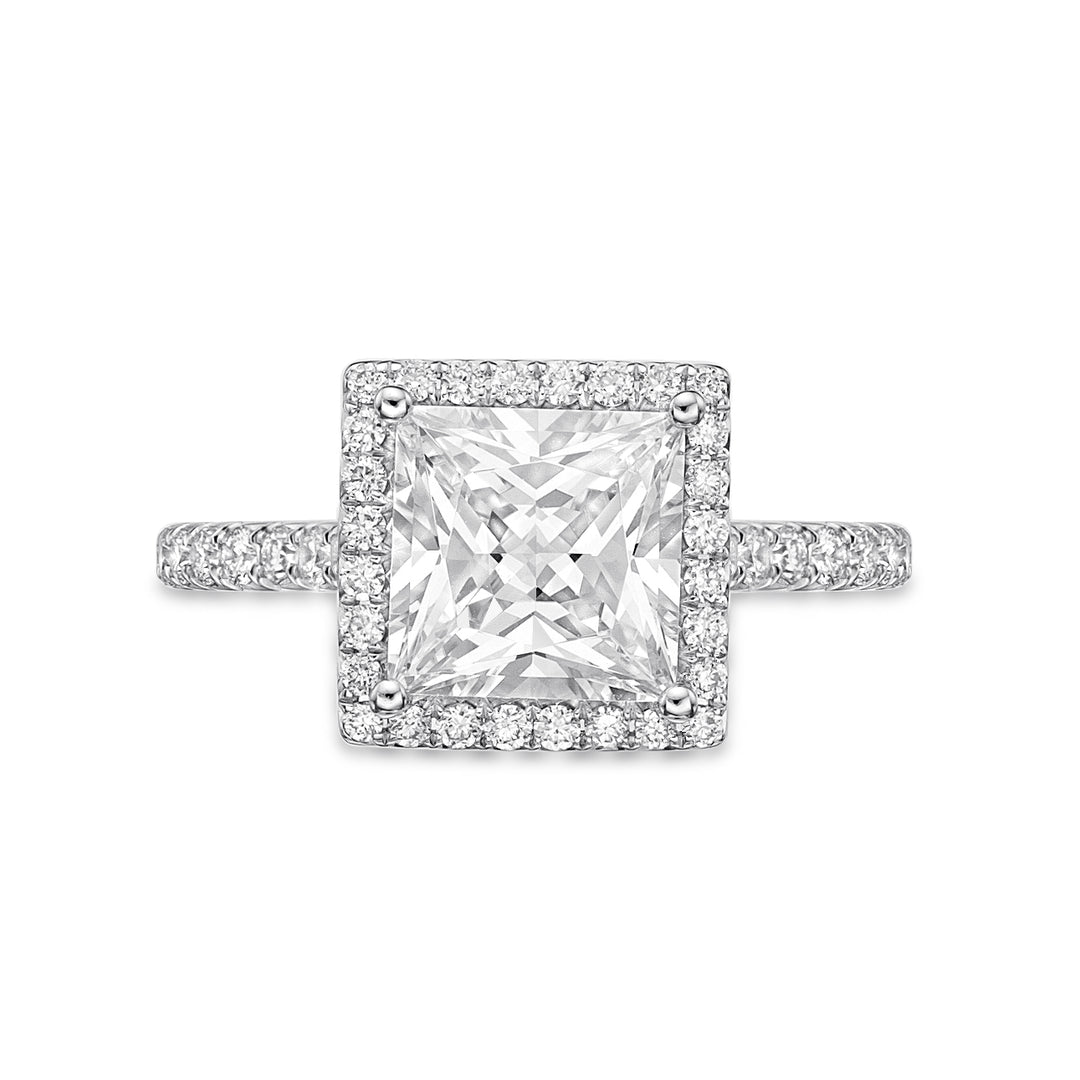 18ct white gold  or Platinum ring featuring a princess cut center diamond set in 4 claws