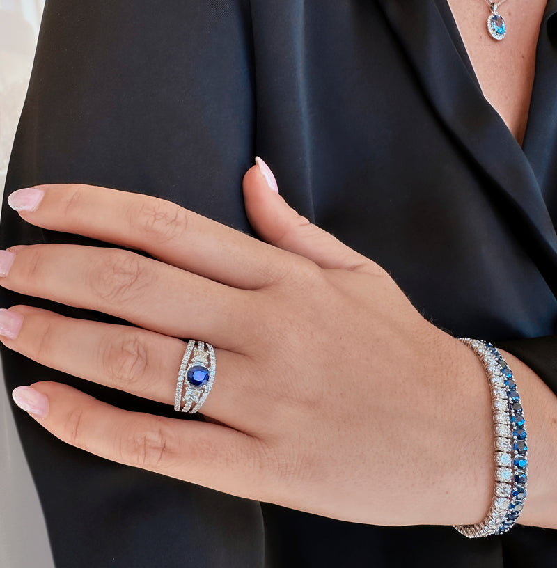 Blue Sapphire Cushion Cut Trilogy Halo Ring
