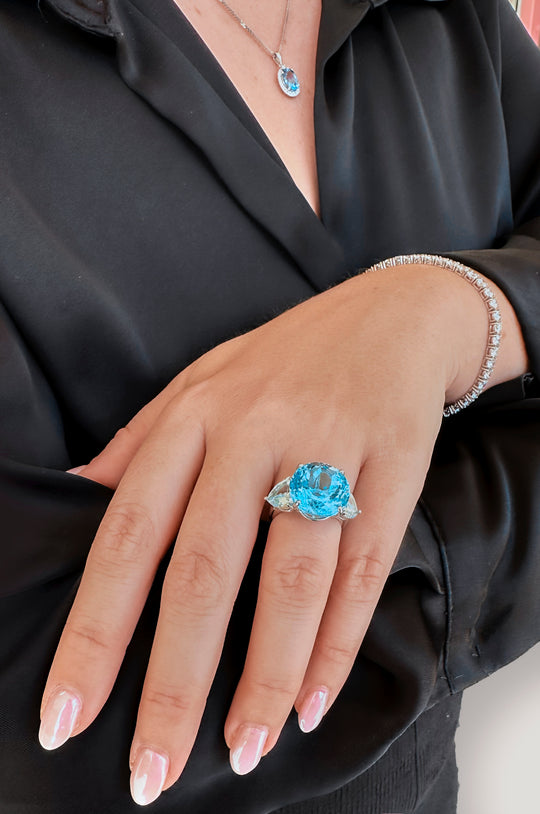 Round Blue Topaz Trilogy Ring