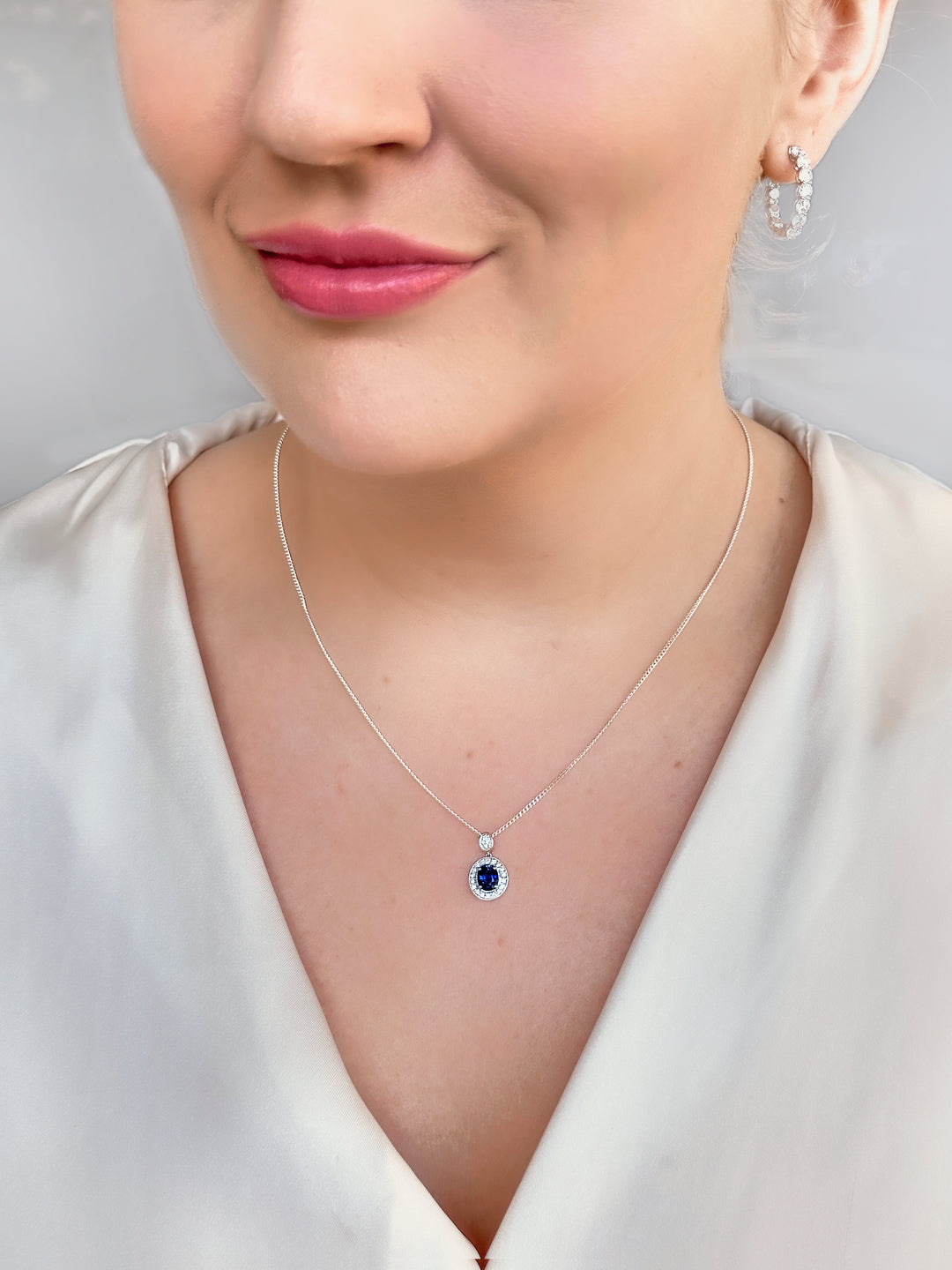 Blue Oval Sapphire and Diamond Pendant