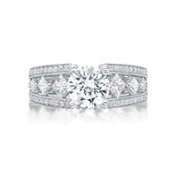 The Bijou is an 18ct white gold featuring Princess cut diamonds single claw set into the shoulders of the band
